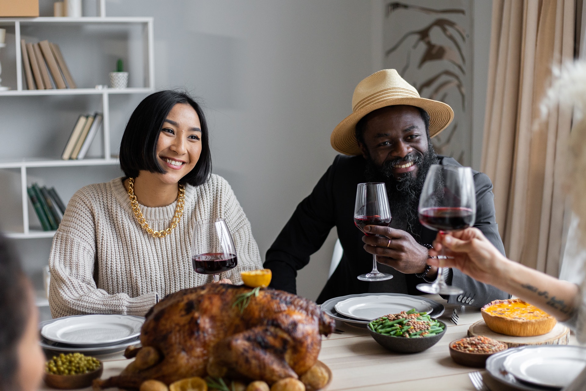 Couple enjoying Thanksgiving dinner.