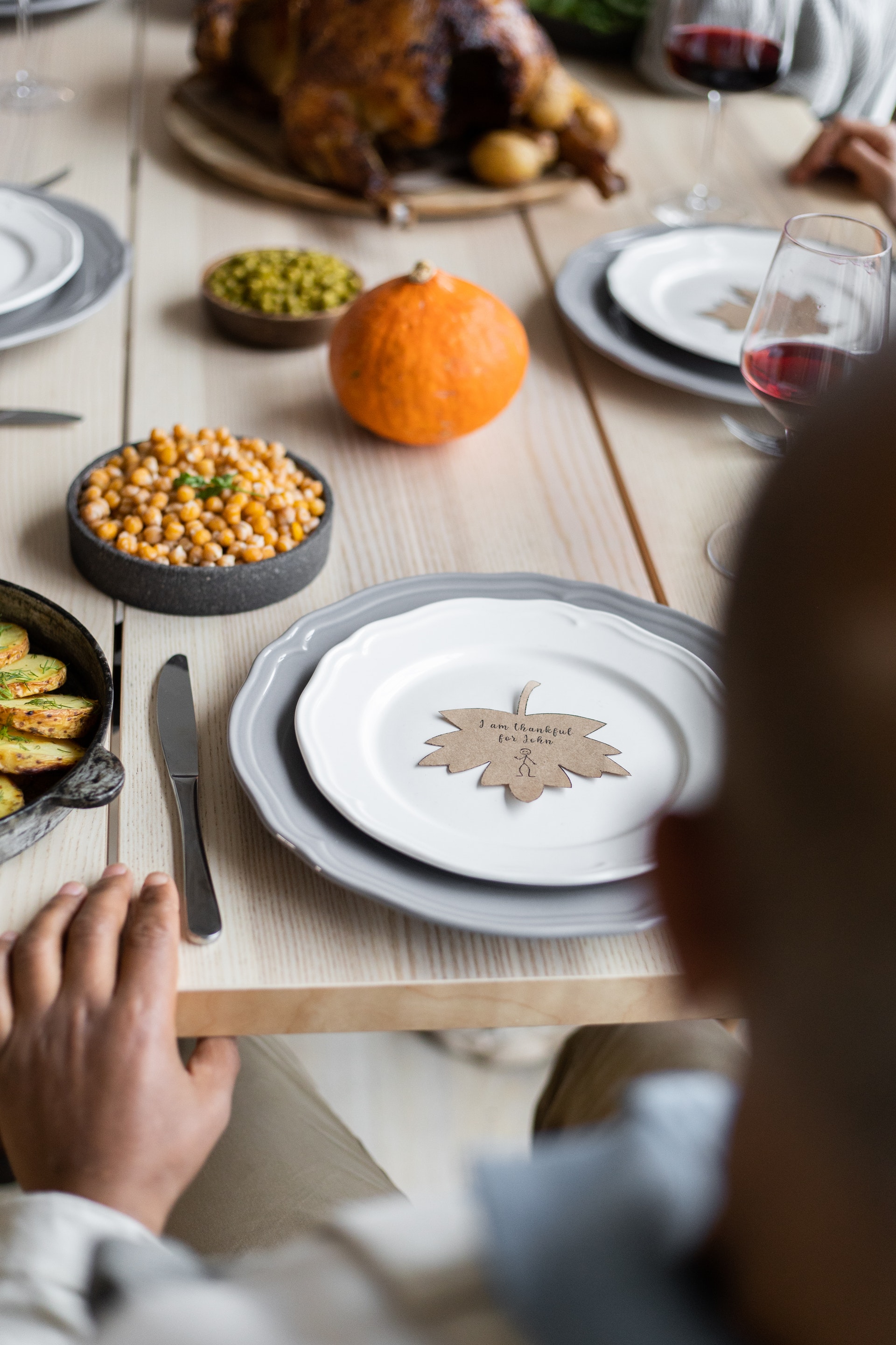 Thanksgiving dinner table setting with healthy food.